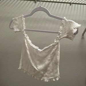 White off the shoulder going out crop top. Size small.